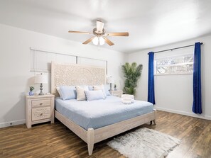 1 bedroom, desk, iron/ironing board, travel crib