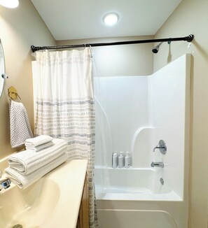 Shower, towels, soap, shampoo