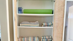 A closet with multiple shelves, some with folded blankets and others with baskets. - Central Encinitas, 1.4 Miles from Beach (Encinitas)