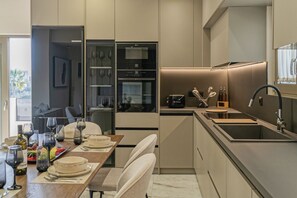 Fridge, microwave, dishwasher, coffee/tea maker
