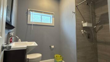 Shower, towels, soap, toilet paper