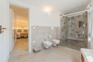 Shower, jetted bath, hair dryer, bidet