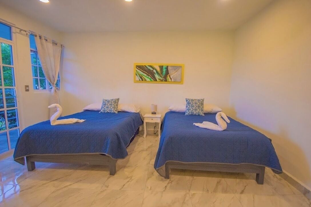 Habitación doble Confort, vista al jardín | Wifi gratis 