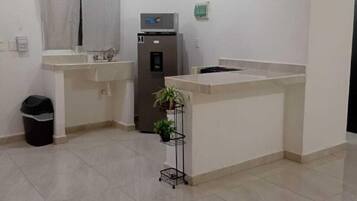 Standard Double Room | Private kitchen | Fridge, microwave