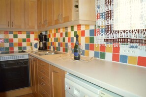Fridge, dishwasher, cookware/dishes/utensils
