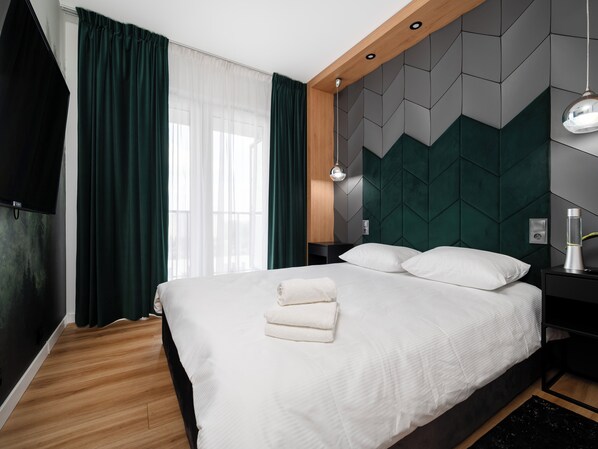 2 chambres, fer et planche à repasser, Wi-Fi, draps fournis