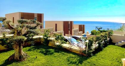Charming 2-bedroom villa with garden and Seaview in Green Coast, Palase