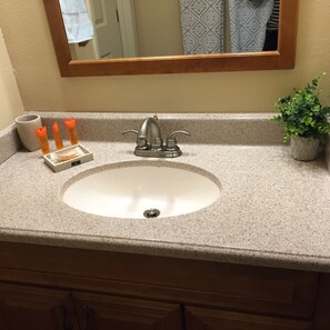 Hair dryer, towels, soap, toilet paper