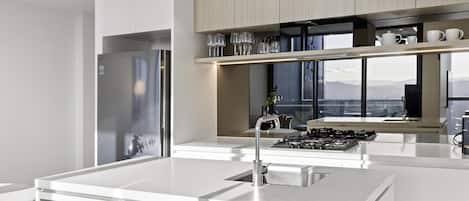 Full-sized fridge, microwave, oven, dishwasher