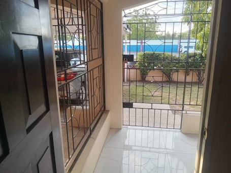 Interior. Charming 2-bedroom house in Portmore with WiFi, AC