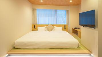 Down duvets, blackout curtains, iron/ironing board, free WiFi