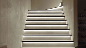 A modern staircase with illuminated steps leading upwards. - Colorstory Hotel (Hangzhou)