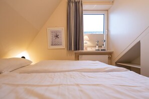 1 slaapkamer, een strijkplank/strijkijzer, wifi