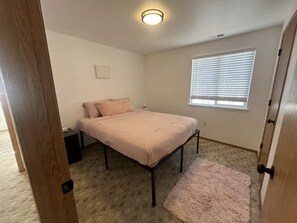 2 bedrooms, desk, iron/ironing board, travel cot