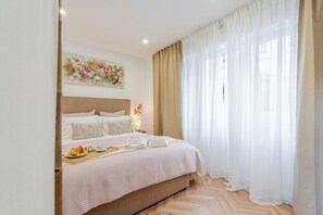 1 habitación, tabla de planchar con plancha, wifi gratis y ropa de cama