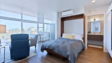1 dormitorio, cuna de viaje, wifi gratis y ropa de cama