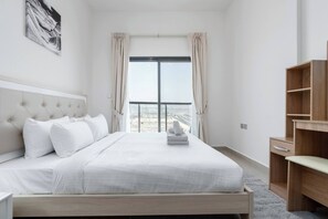 2 habitaciones y tabla de planchar con plancha 