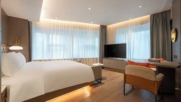 Executive Room | Living area | 58-inch LCD TV with cable channels