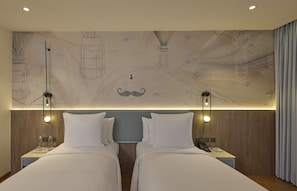 Premium bedding, down comforters, minibar, in-room safe