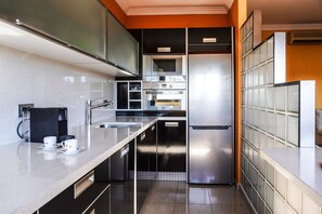 Fridge, microwave, coffee/tea maker, electric kettle