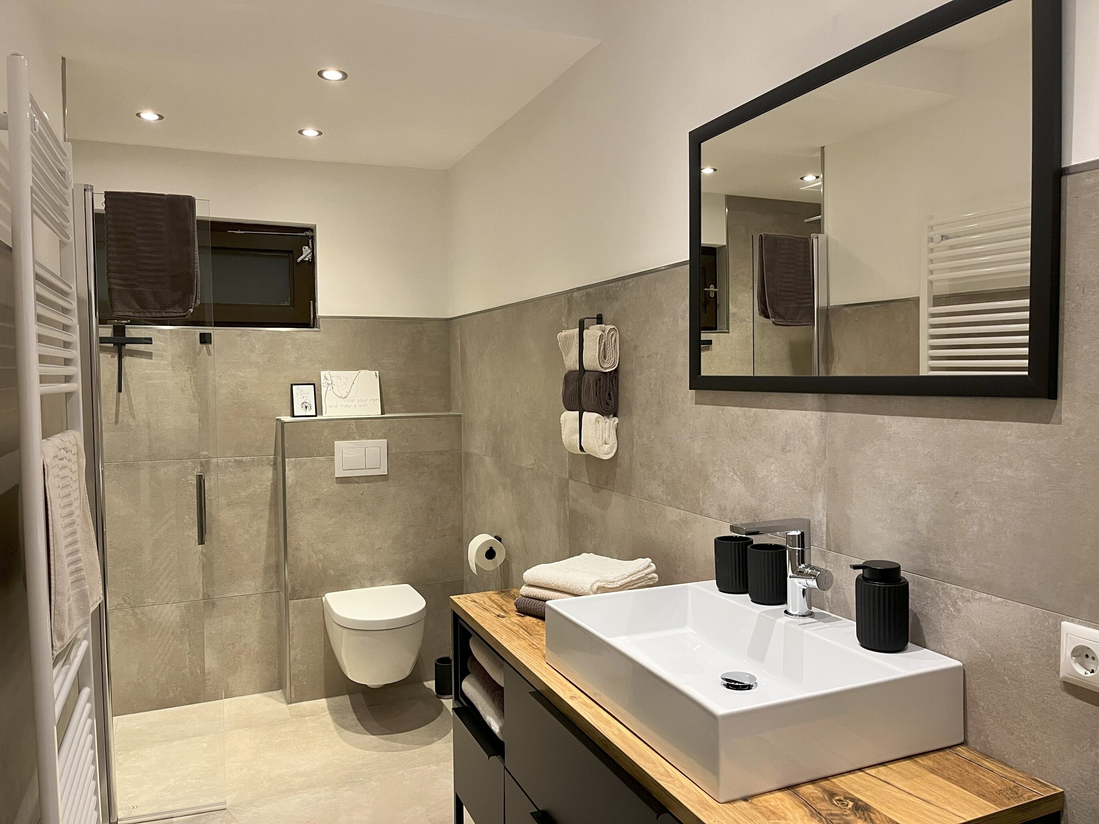 Shower, hair dryer, towels