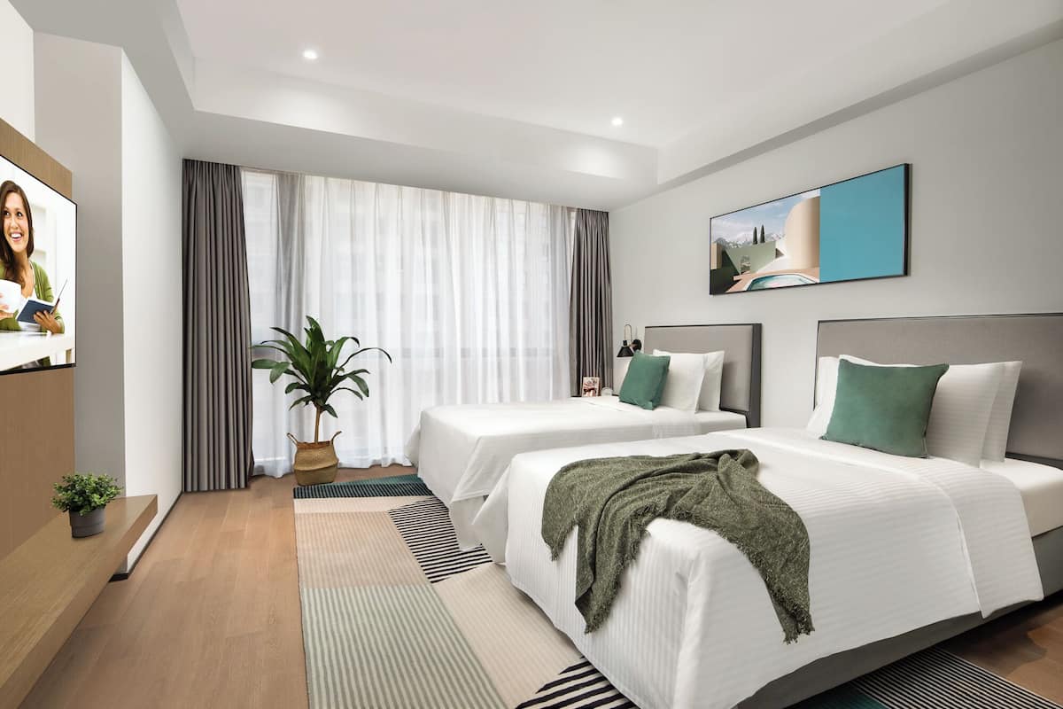 Grand Twin kamer, niet-roken, kitchenette | 1 slaapkamer, verduisterende gordijnen, geluiddichte muren