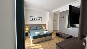 Luxury Double Room, Sea View | Desk, laptop workspace, blackout drapes, soundproofing - Seaside Suites (Naples)