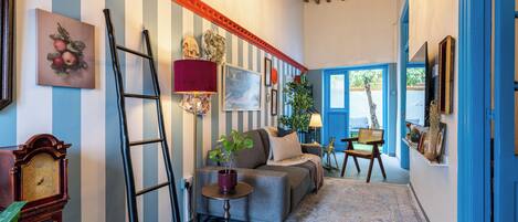 House, City View, Garden Area | Living area | 50-inch Smart TV with digital channels, streaming services