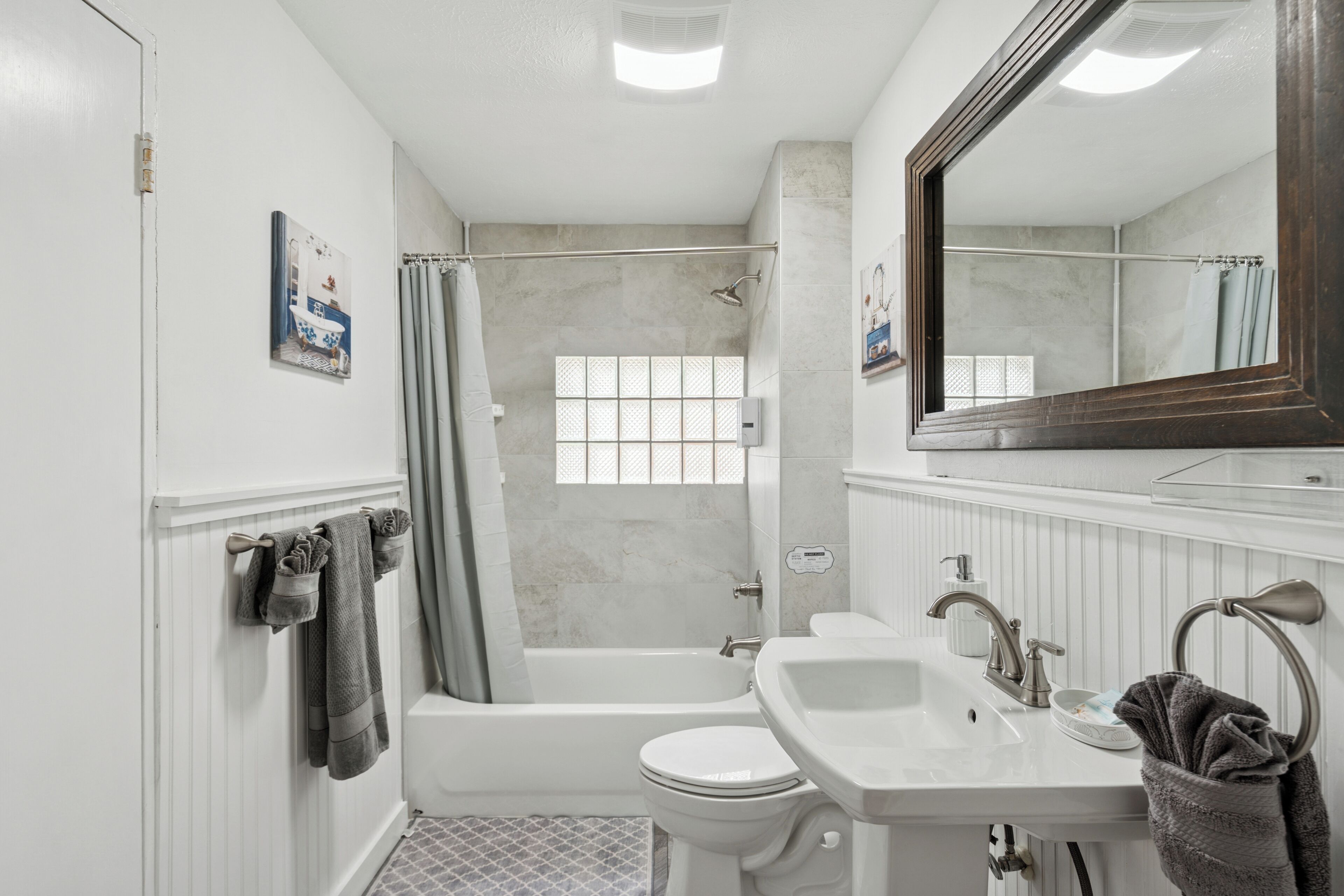 Hair dryer, towels, soap, toilet paper