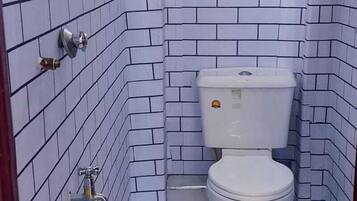 Shower, slippers, towels, soap