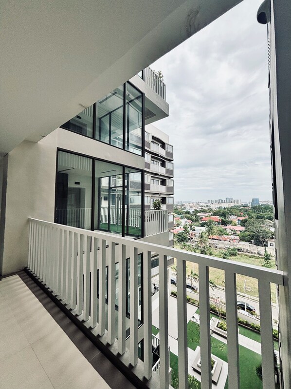 Condo, 2 Bedrooms | Balcony - Perfect Stay for Family & Friends (Iloilo)
