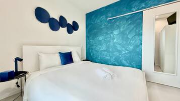 1 dormitorio, tabla de planchar con plancha, Internet y ropa de cama