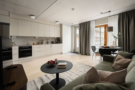 Comfort Apartment, 1 Bedroom | Living area | 43-inch TV with digital channels