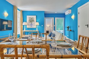 Fjölskyldusvíta - borgarsýn | Stofa | Flatskjársjónvarp