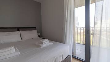 Apartment (1 Bedroom) | 1 bedroom, iron/ironing board, cribs/infant beds, bed sheets