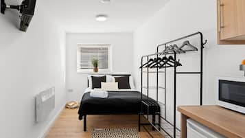 1 Schlafzimmer, BĂŒgeleisen/BĂŒgelbrett, kostenloses WLAN, BettwĂ€sche