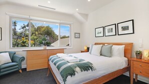 1 bedroom, desk, iron/ironing board, travel crib