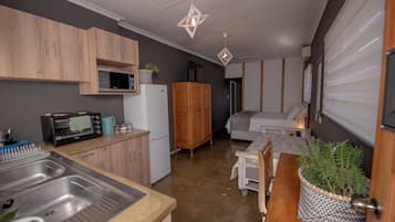 Elite Studio, Patio, Ground Floor | Living area