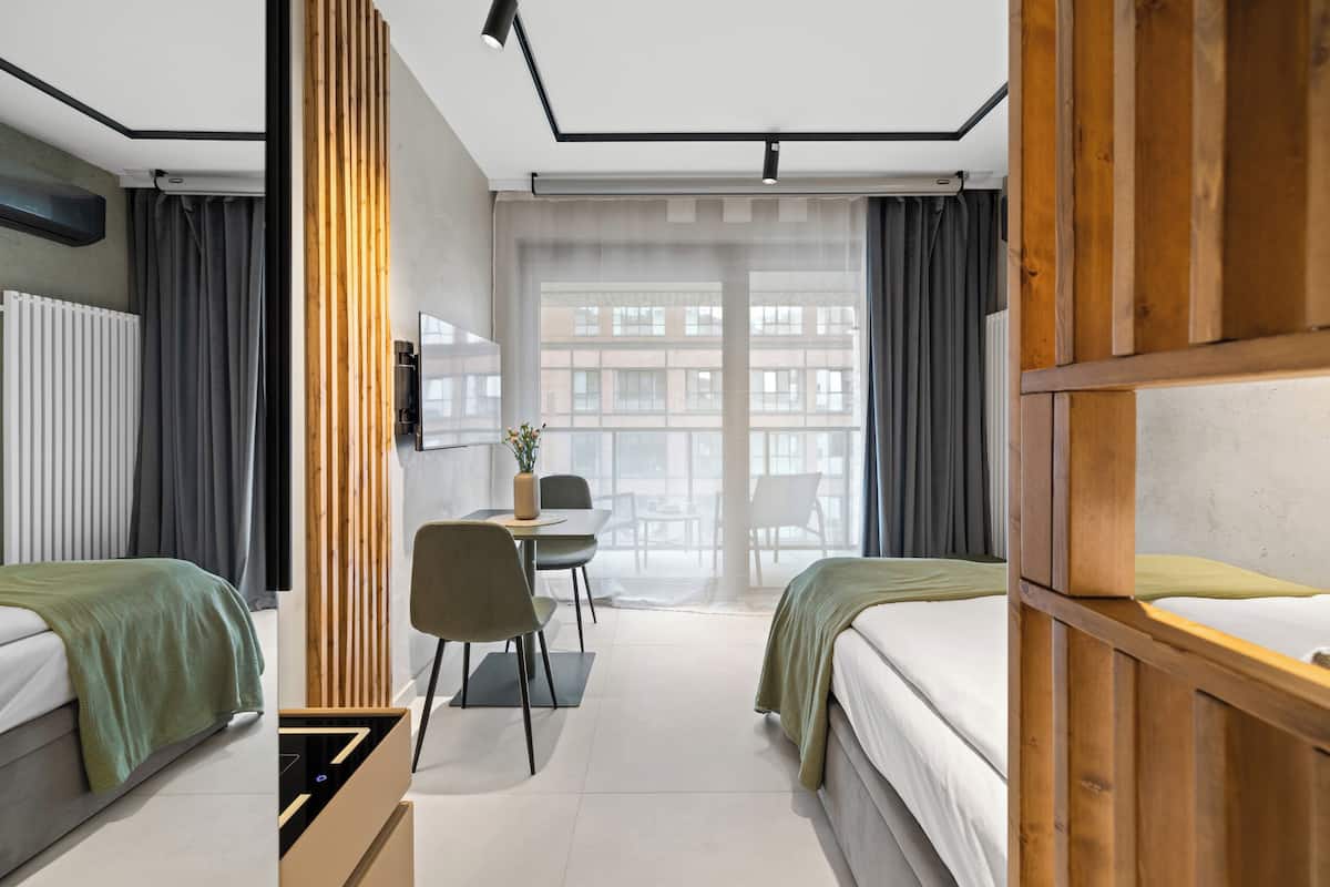 Classic Studio Suite | Premium bedding, blackout curtains, iron/ironing board, free WiFi
