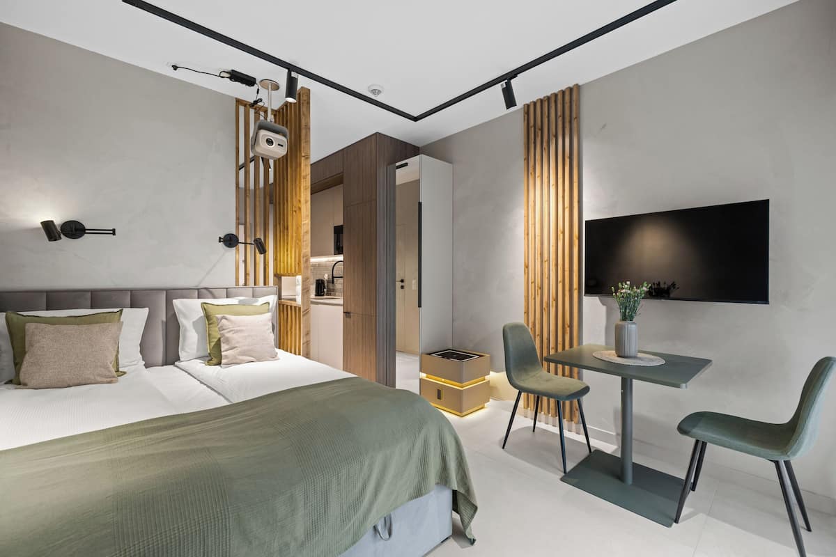 Premium bedding, blackout curtains, iron/ironing board, free WiFi