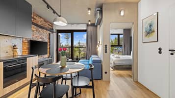 Comfort Apartment | Individually decorated, blackout drapes, iron/ironing board, free WiFi