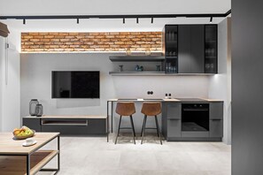 Comfort appartement, balkon | Woonruimte | Flatscreentelevisie