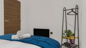 2 dormitorios, tabla de planchar con plancha, wifi y ropa de cama