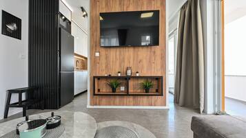 Deluxe Apartment, 3 Bedrooms, Private Pool, Pool View | Living area | 32-inch TV with digital channels