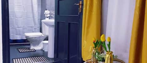 Shower, slippers, towels, soap