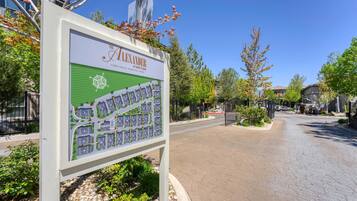 A signboard with a map of a residential area, including a labeled "TOWNHOUSE" section.
