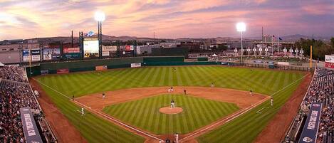 A baseball stadium with a large seating area and a field marked with the team name "Aces".