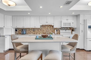 Fridge, microwave, oven, stovetop - Our Sunrise Nest,SeaClub #29~Large balcony w/ awesome water view (Indian Shores)