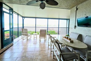 Outdoor dining - Our Sunrise Nest,SeaClub #29~Large balcony w/ awesome water view (Indian Shores)