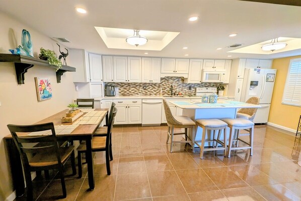 Fridge, microwave, oven, stovetop - Our Sunrise Nest,SeaClub #29~Large balcony w/ awesome water view (Indian Shores)